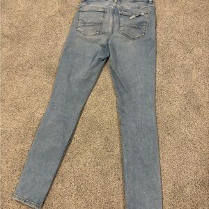 AE Next Level Super High-Waisted Ripped Jegging